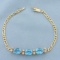 Swiss Blue Topaz And Diamond Figaro Bracelet In 14k Yellow Gold