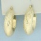 Diamond Cut Hoop Earrings In 14k Yellow Gold