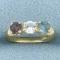 Rainbow Topaz Childs Heart Ring In 10k Yellow Gold