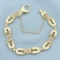 Italian Designer Horseshoe Link Bracelet In 14k Yellow Gold