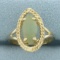 Jade Solitaire Ring In 10k Yellow Gold