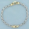 Two Tone Designer Cable Link Bracelet In 14k White And Yellow Gold