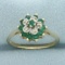 Emerald And Diamond Flower Ring In 10k Yellow Gold