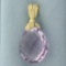 Checkerboard Cut Teardrop Amethyst Swivel Pendant In 14k Yellow Gold