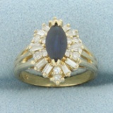 Sapphire And Diamond Halo Ring In 14k Yellow Gold