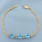 Swiss Blue Topaz And Diamond Figaro Bracelet In 14k Yellow Gold