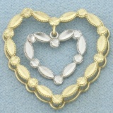 Diamond Cut Heart In Heart Pendant In 10k Yellow And White Gold