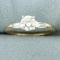 Round And Baguette Diamond Engagement Ring In 14k Yellow And White Gold