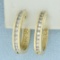 Diamond Oval Hoop Earrings In 14k Yellow Gold