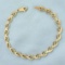 Diamond Cut Designer Heart Link Bracelet In 10k Yellow Gold