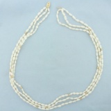 Triple Strand Baroque Pearl And Gold Bead Necklace In 14k Yellow Gold