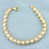 Cultured Akoya Pearl Bracelet In 14k Yellow Gold