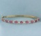 Ruby And Diamond Hinged Bangle Bracelet In 14k Yellow Gold