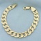 Mens Heavy Curb Link Bracelet In 14k Yellow Gold