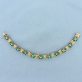 Vintage Emerald And Diamond Flower Design Bracelet In 14k Yellow Gold