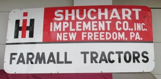 Shuchart Implement Company Farmall tractors and McCormick Farm Equipment Sign