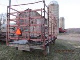 Flat bed hay wagon with metal racks