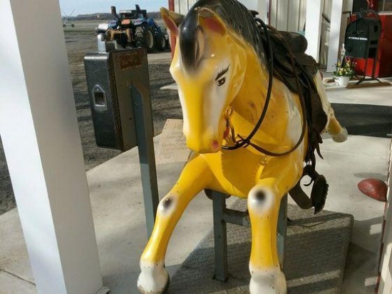 Coin operated 1960's style store front rocking horse in working condition