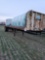 Flatbed single axle tender trailer with Poly tanks