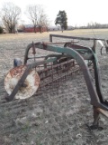 Roller bar hay rake