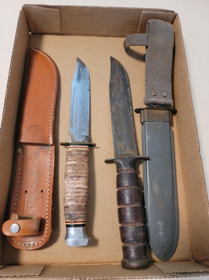 2 kabar knives. W cases.