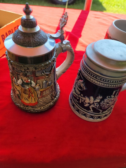 4 beer steins. 2 Germany