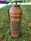 Copper paragon fire extiguisher.