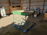 Receiving belt, washer, and rotary grading table