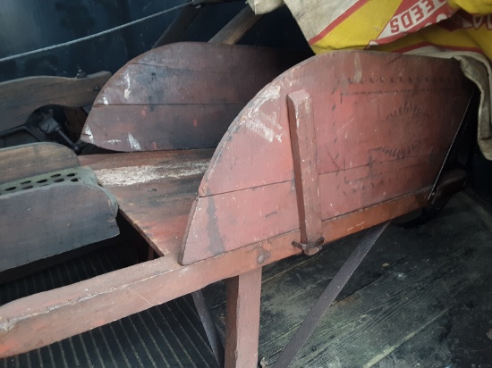 Antique wooden wheelbarrow