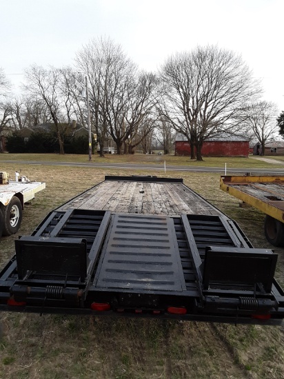 2003  12.5 ton  HUD trailer black in color,
