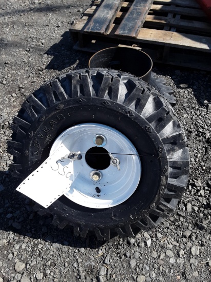 Set of 5.70-8 tires on rims taken off stump