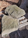 2 flowerbed rocks.