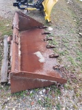 Skidloader bucket w/rock teeth.