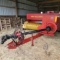 New Holland 575 baler, with belt thrower