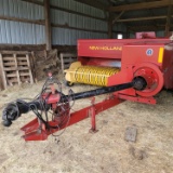 New Holland 575 baler, with belt thrower