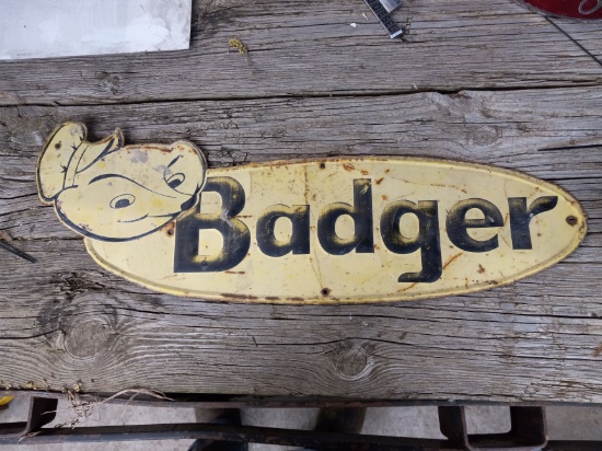 Metal badger sign
