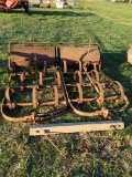 Drag harrow w/attached roller.