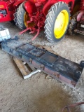 Skid loader quick disconnect grader blade