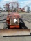 Model 3700 Ditch Witch with blade and trencher,