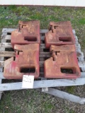 100 lb front IH tractor weights.  Times the $
