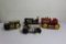 (4) tin toy wind up tractors