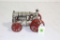 cast iron toy tractor with driver