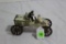Vintage cast iron car with driver (steering wheel broken)