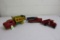 (3) toy dump trucks