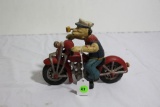 Cast Iron Popeye on motorcycle