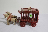 cast iron horse drawn circus wagon with giraffe toy
