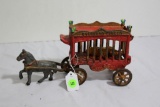 cast iron horse drawn circus wagon with tiger toy