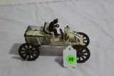 Vintage cast iron car with driver (steering wheel broken)