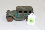 1930 cast iron toy sedan with tin wheels