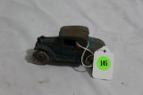 Arcade cast iron toy car with tin wheels